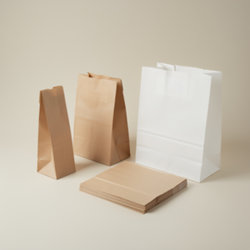Sac SOS publicitaire personnalisé aux couleurs de votre enseigne Sacs SOS publicitaires en papier sans poignée avec découpe de prise intégrée